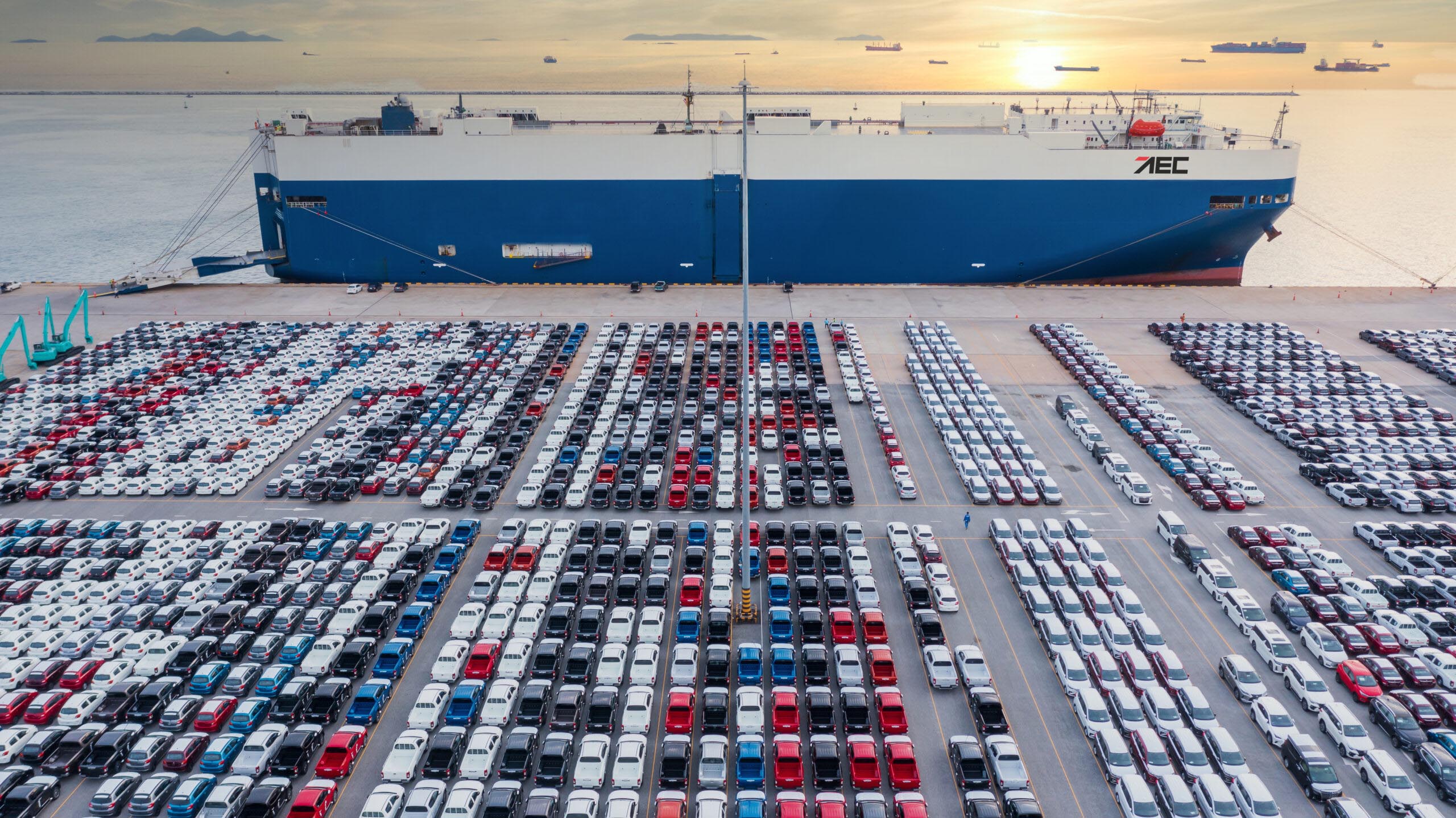 Aerial view of vehicles at the Port of Antwerp-Bruges ready for import processing.